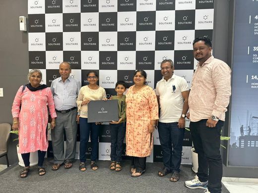 Ashiyana Real Estate clients and team at a property handover